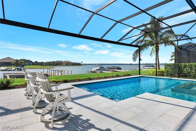 view of swimming pool featuring a lanai, a patio area, and a water view