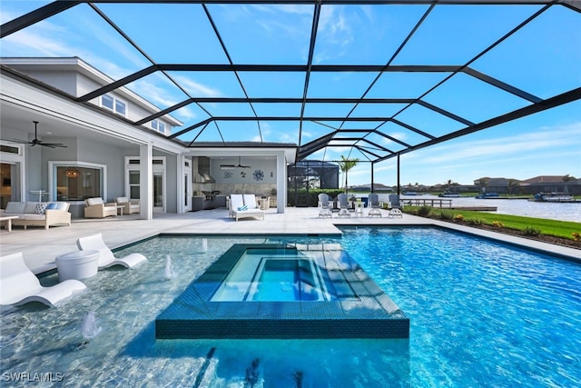 view of pool with a patio, ceiling fan, glass enclosure, and outdoor lounge area