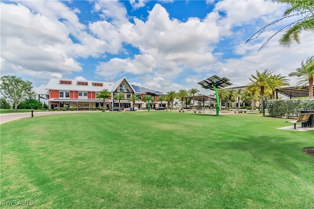 view of home's community featuring a lawn and a gazebo