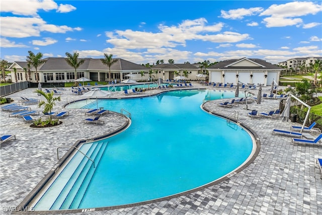 view of swimming pool featuring a patio