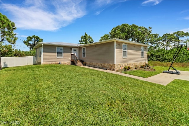 view of front of house with a front lawn