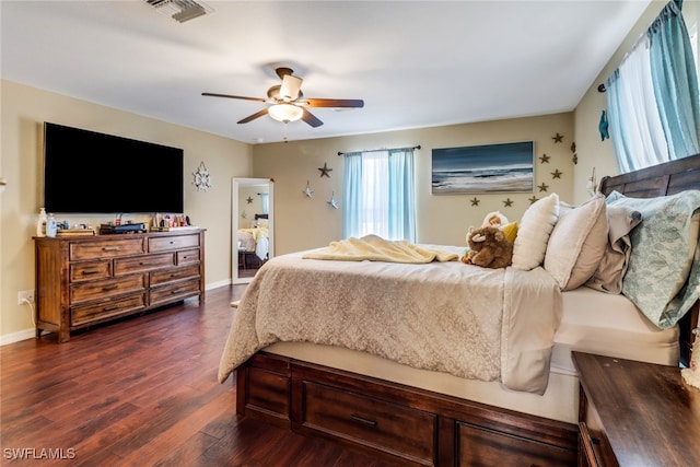 bedroom featuring ceiling fan and dark hardwood / wood-style flooring