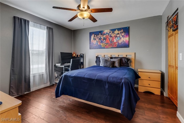 bedroom featuring ceiling fan and dark wood-type flooring