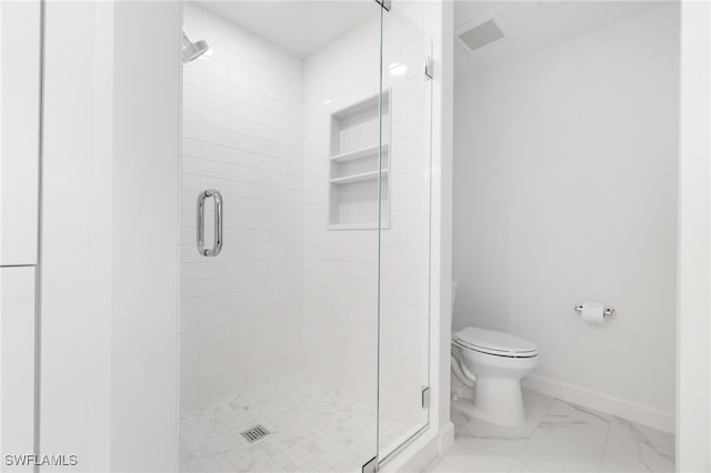 full bathroom featuring toilet, a shower stall, baseboards, and marble look tile flooring