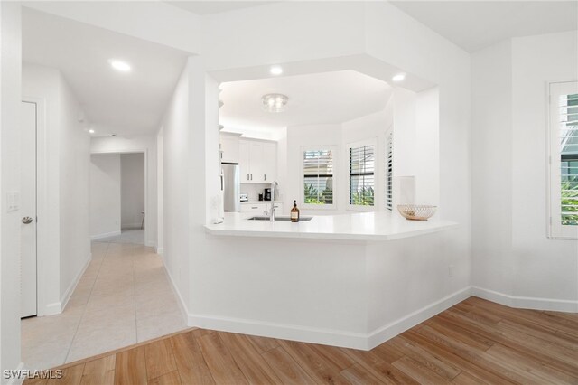 bathroom featuring hardwood / wood-style flooring and sink