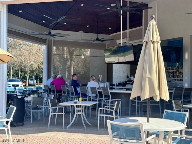 view of patio featuring ceiling fan