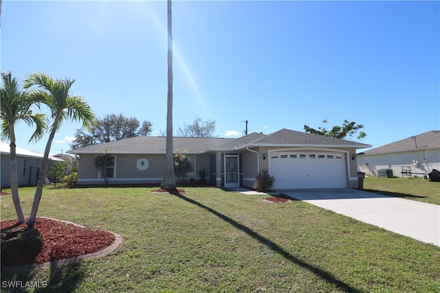 single story home featuring a garage and a front lawn