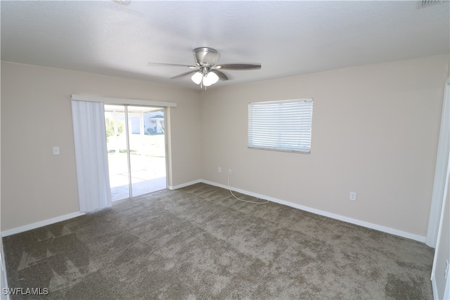 carpeted empty room with ceiling fan