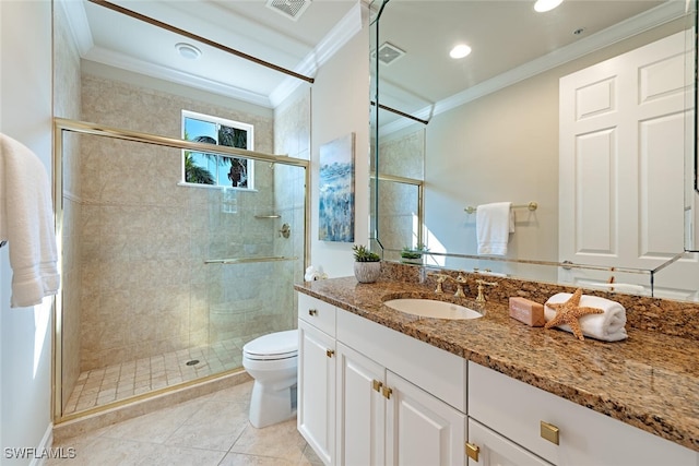 bathroom with toilet, visible vents, ornamental molding, and a shower stall