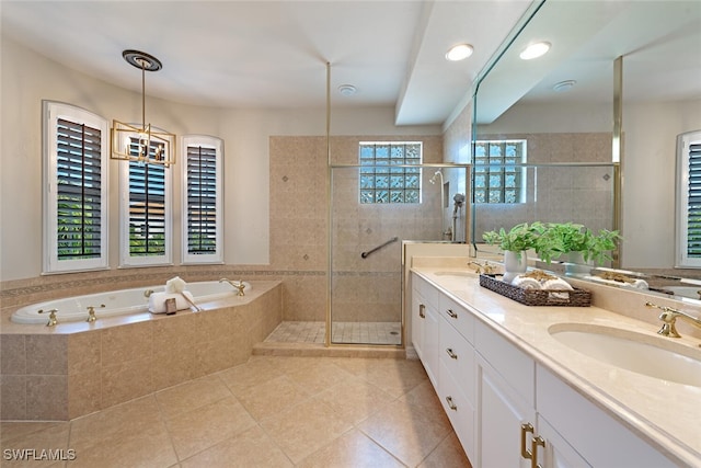 bathroom featuring vanity, separate shower and tub, and tile patterned floors