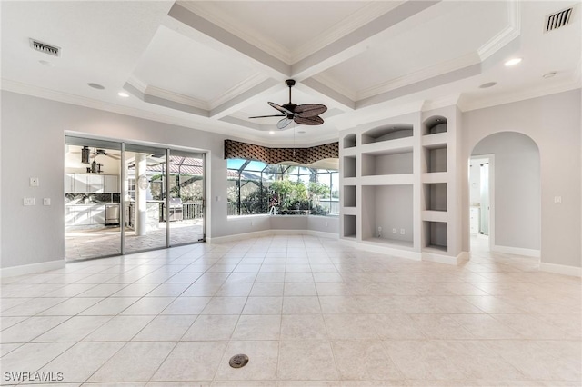 spare room with built in shelves, coffered ceiling, crown molding, light tile patterned floors, and ceiling fan