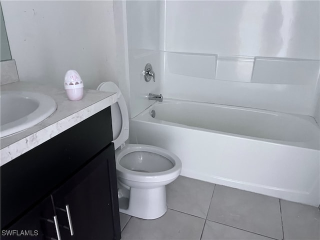 full bathroom featuring vanity, tile patterned flooring, toilet, and bathing tub / shower combination