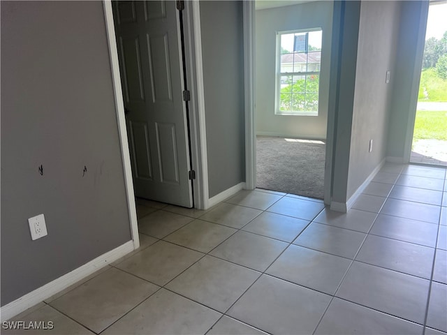 interior space featuring light tile patterned floors