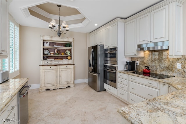 kitchen with pendant lighting, white cabinets, stainless steel appliances, an inviting chandelier, and crown molding