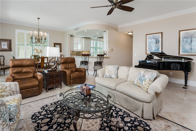 tiled living room featuring ceiling fan with notable chandelier and crown molding