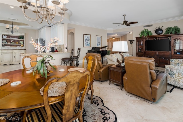 dining room featuring ceiling fan with notable chandelier and crown molding