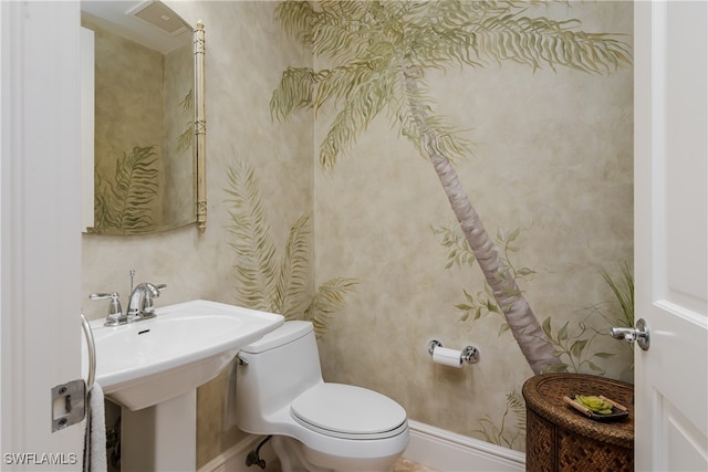 bathroom with sink and toilet