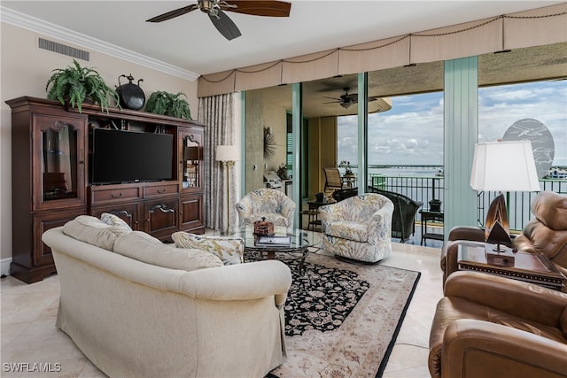 tiled living room featuring ceiling fan and crown molding