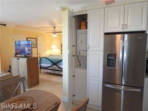 kitchen featuring white cabinets, ceiling fan, and stainless steel fridge with ice dispenser