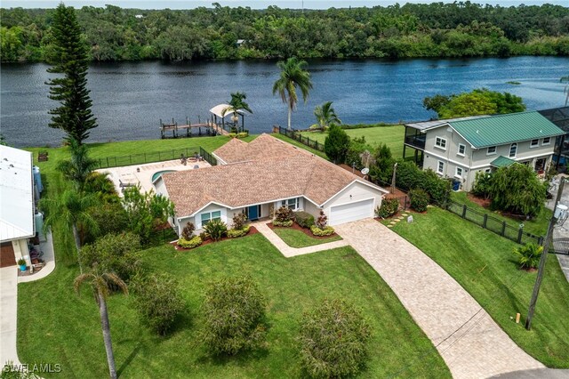 2110 Sebastian Ct, Alva, FL 33920 - view from above of property with a large body of water and a heavily wooded area