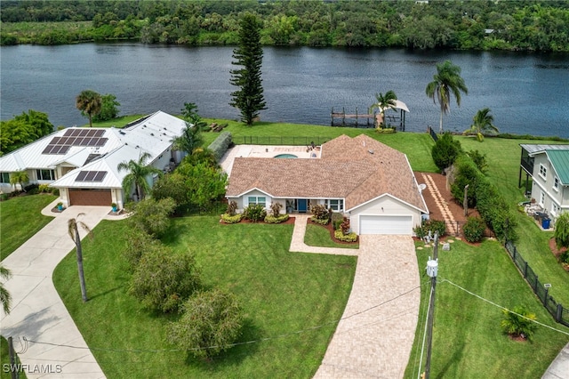 bird's eye view with a water view