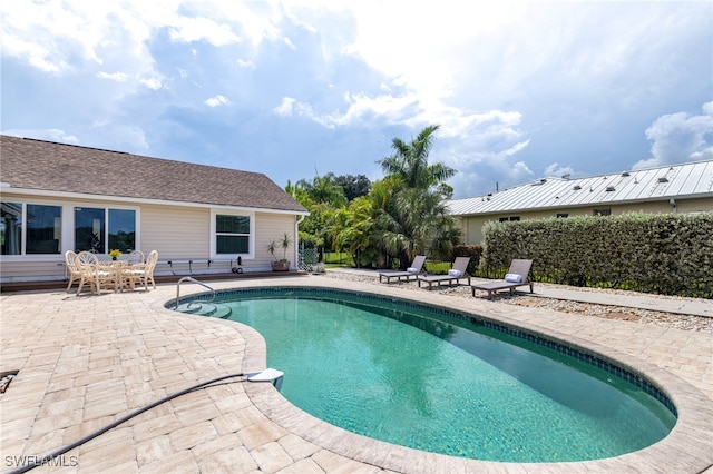 view of pool with a patio