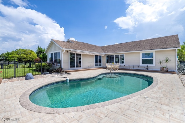 view of pool featuring a patio area