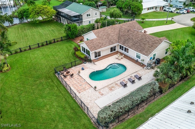 view of pool with a yard and a patio area