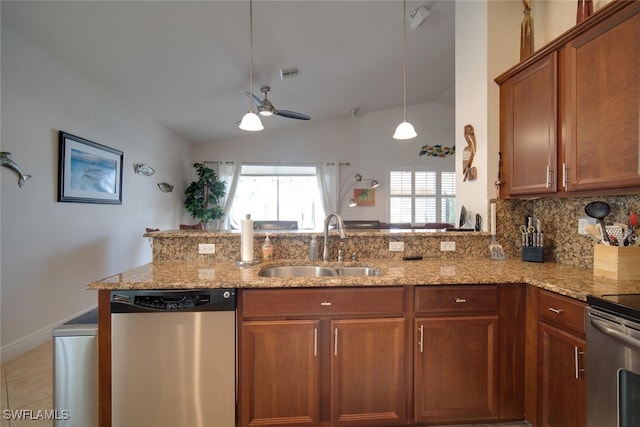 kitchen with sink, lofted ceiling, kitchen peninsula, and stainless steel dishwasher