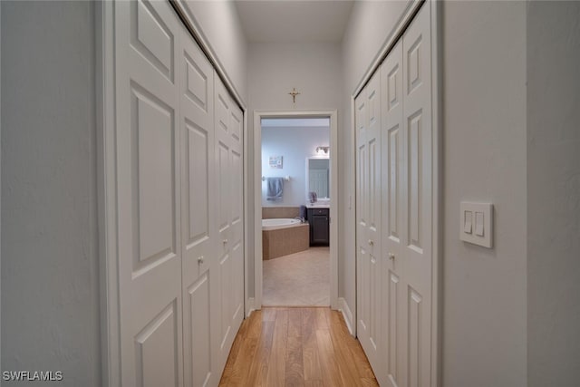 hall featuring light hardwood / wood-style floors