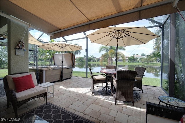 view of patio featuring a water view