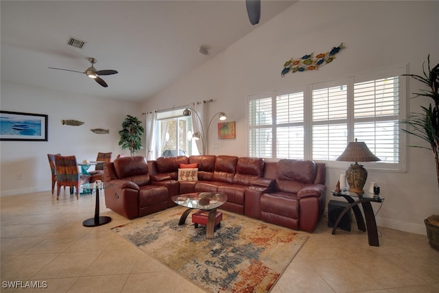 tiled living room featuring vaulted ceiling and ceiling fan