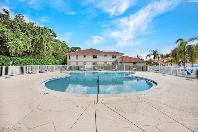 view of pool with a patio