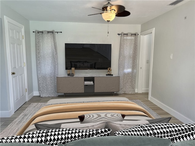 interior space with light hardwood / wood-style floors and ceiling fan