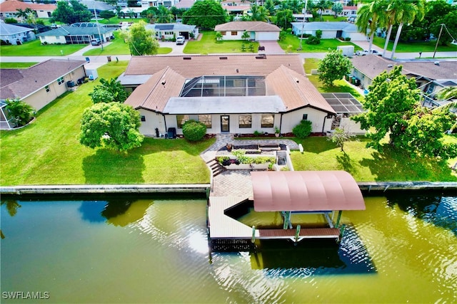 bird's eye view with a water view