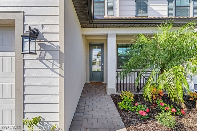 doorway to property featuring a garage