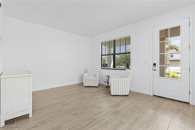 unfurnished room featuring light wood-type flooring