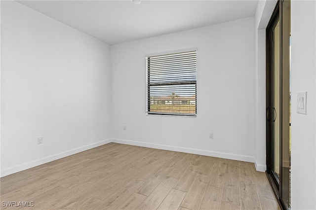 empty room featuring light hardwood / wood-style floors