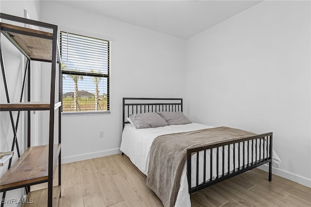 bedroom featuring light hardwood / wood-style flooring