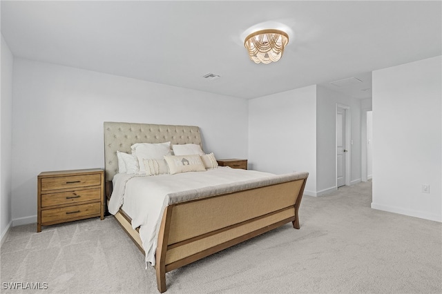 bedroom with light colored carpet