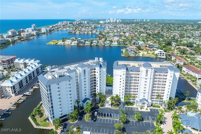 drone / aerial view with a water view