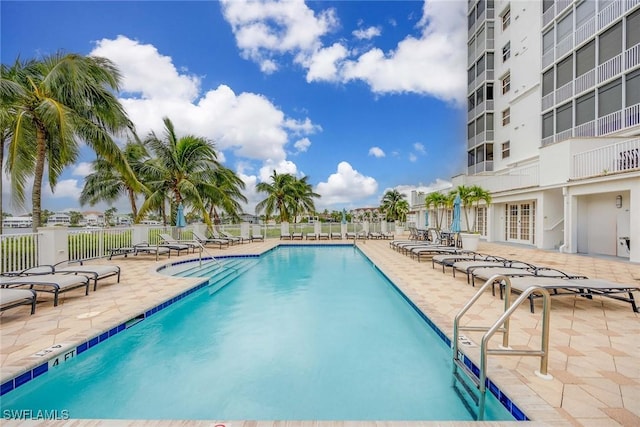 view of pool featuring a patio