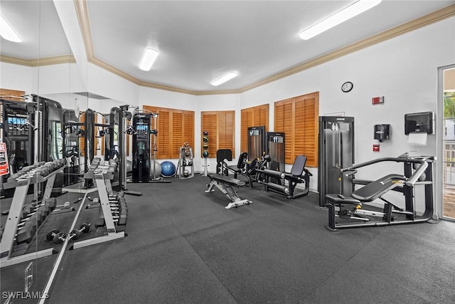 gym featuring crown molding