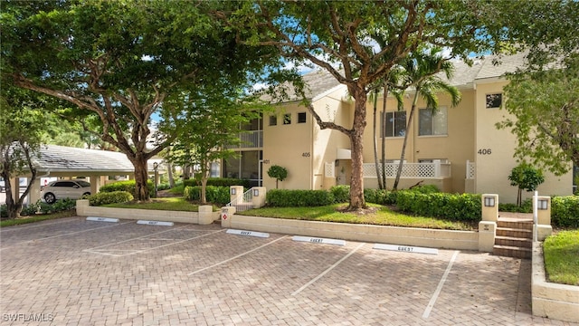 view of building exterior with a carport