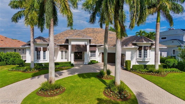 view of front of property with a front lawn