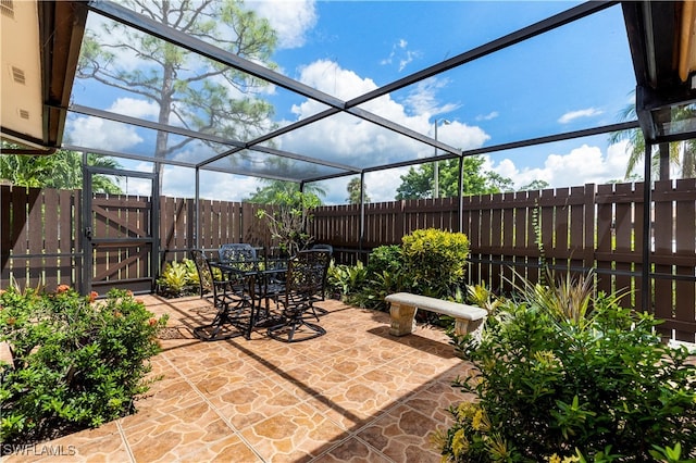 view of patio / terrace with glass enclosure