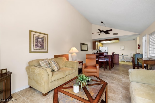 living room with ceiling fan and high vaulted ceiling