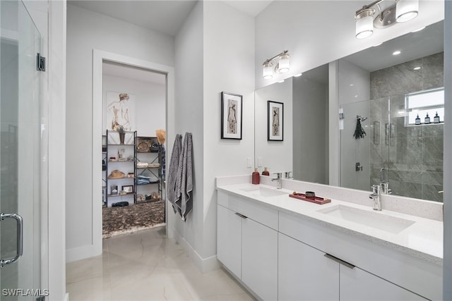 bathroom with vanity and an enclosed shower