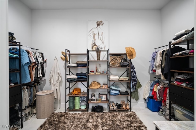 walk in closet featuring light tile patterned floors