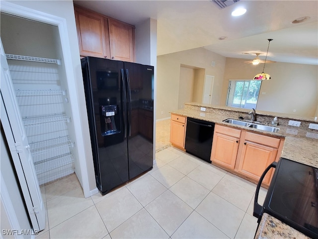 kitchen with black appliances, light tile patterned floors, sink, and ceiling fan